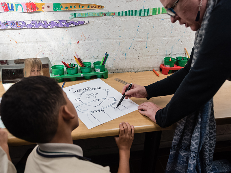 oakley house teacher instructing learner